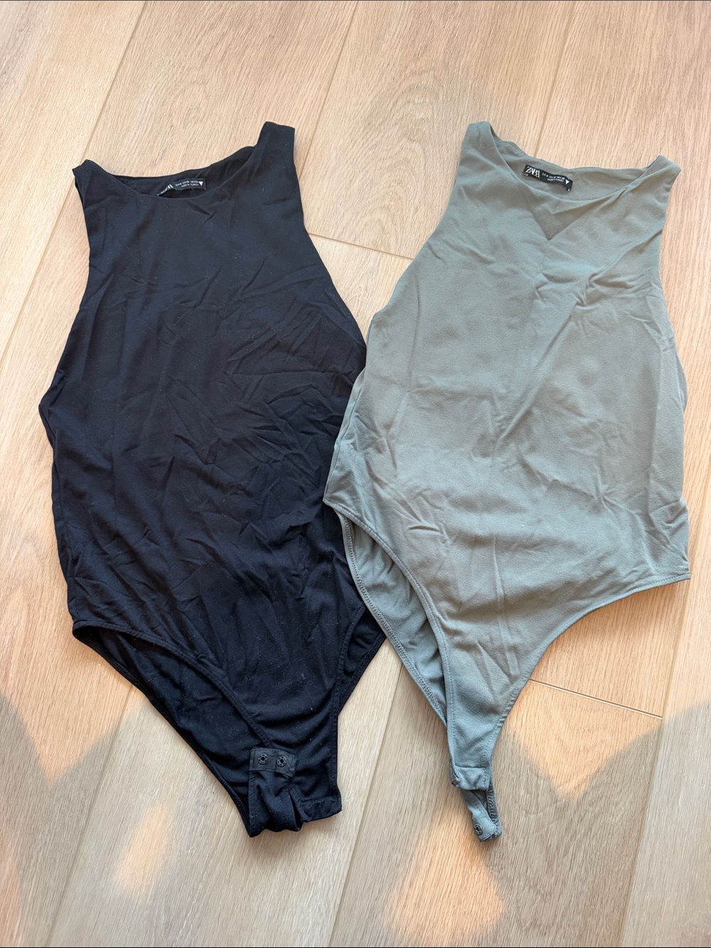 Zara Sleeveless One-Piece Bodysuits in Black and Sage